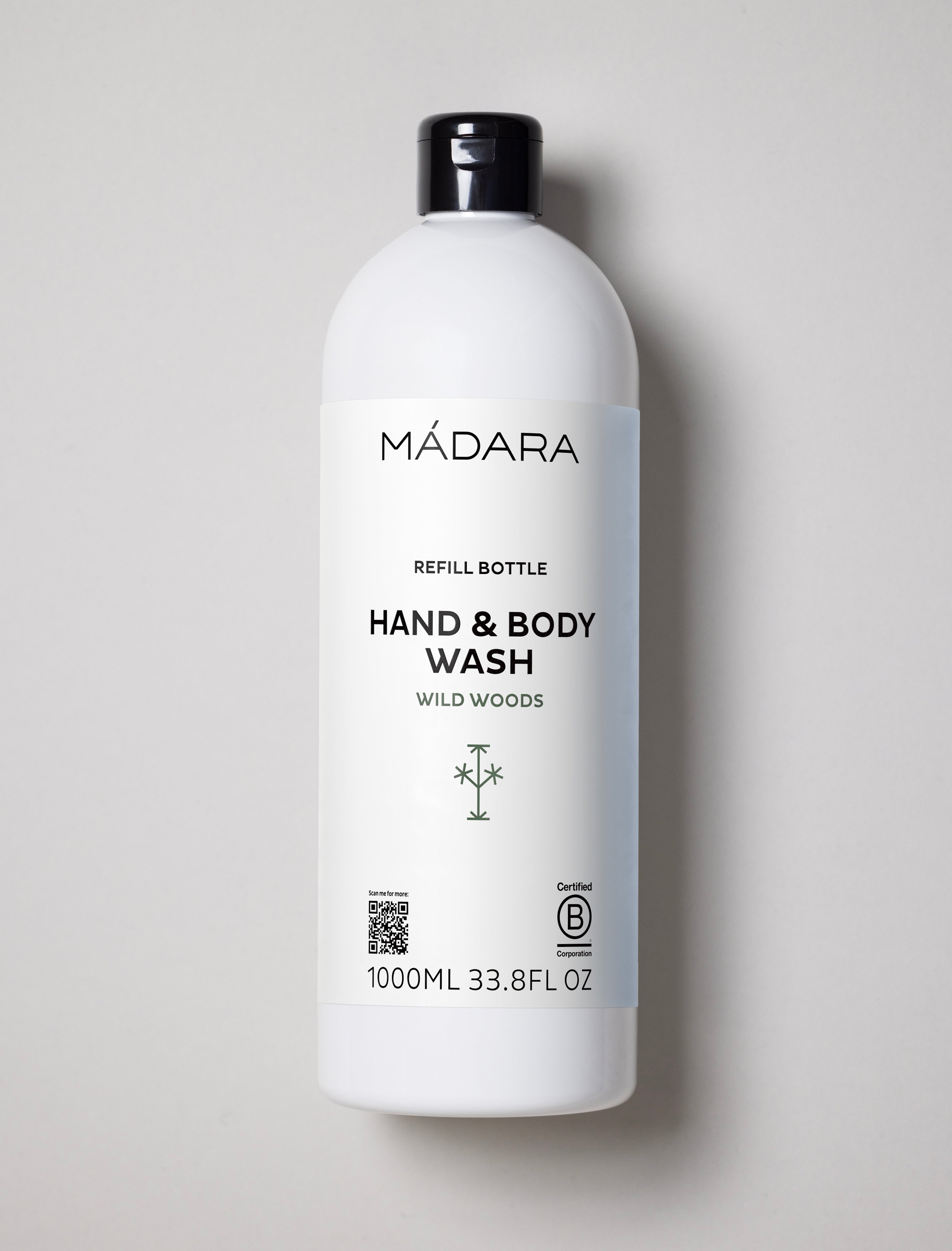 Mádara hand and body wash bottle on a light gray background